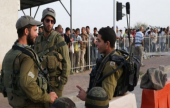 اعتقال 18 عاملا ًفلسطينياً بحجة العمل دون تصاريح | موقع سوا 